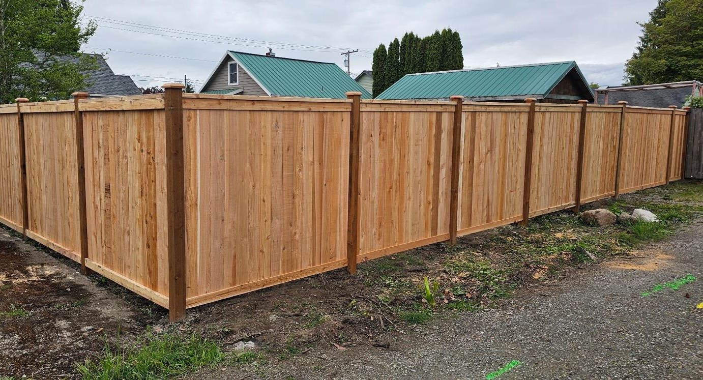 Wood privacy fence installed by De Dios Construction LLC